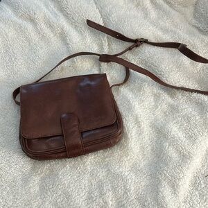 Dunbar small brown crossbody purse. 4 sections and 3 zippered pockets